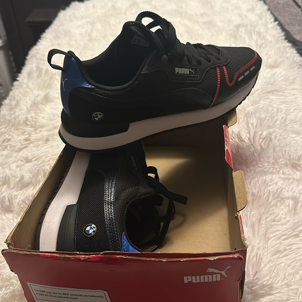 Means Pumas tennis shoes.